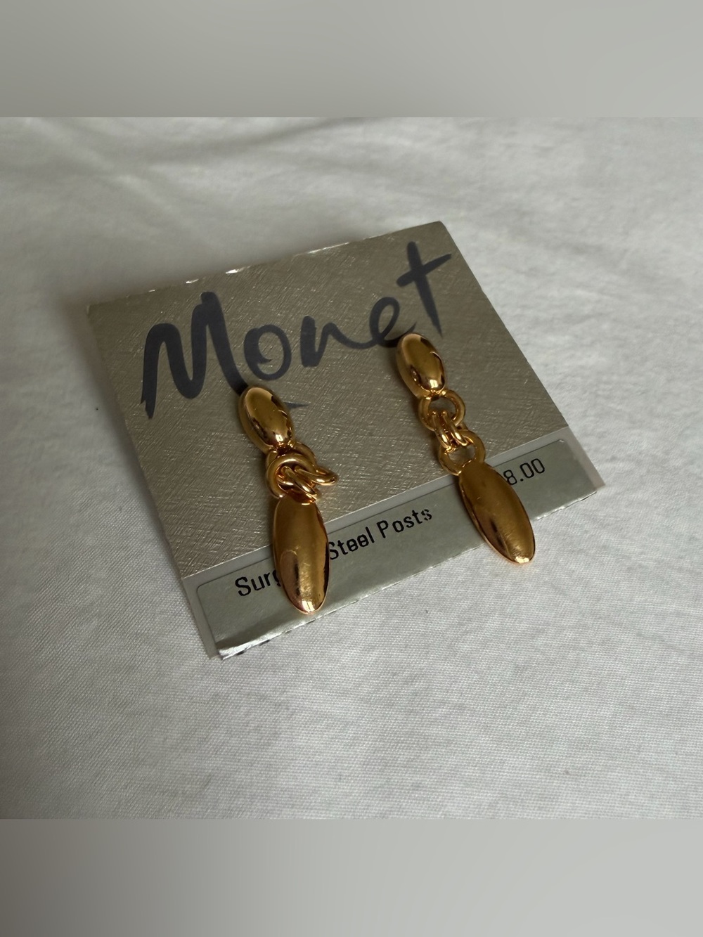 NWT Monet gold dangly earrings